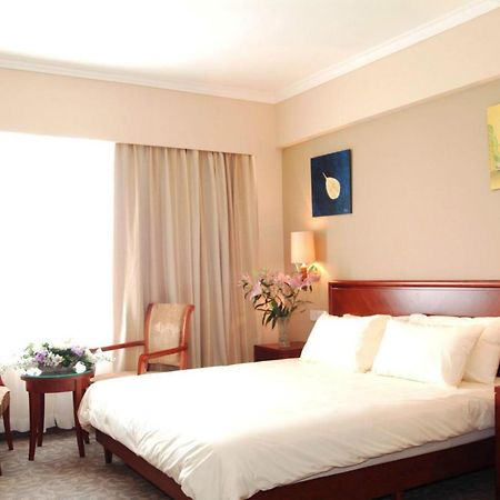 Greentree Inn Shanghai Dongming Road Subway Station Express Hotel Bagian luar foto
